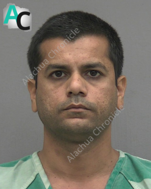 Doctor charged with using AI to remove bikinis from social media photos of young girls