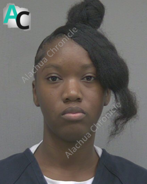 Woman on Pretrial Diversion Arrested for Kicking, Spitting at Officers